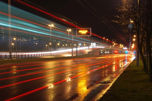 Fast moving cars at night — Stock Photo, Image