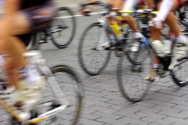 Motion blur abstract of a bike riders on the street — Stock Photo, Image