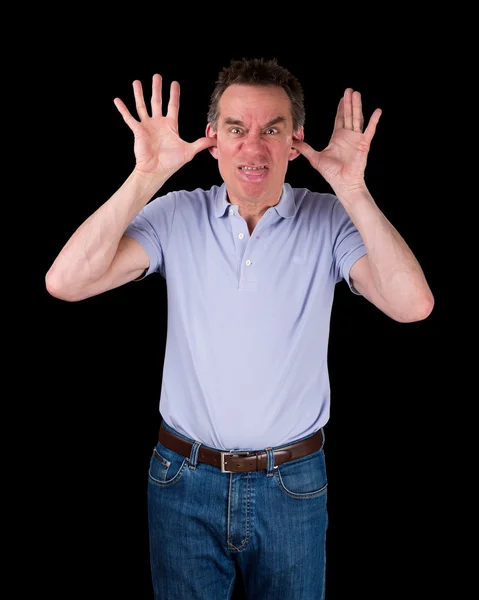 Angry Man Poking Out Tongue with Hands in Ears — Stock Photo, Image