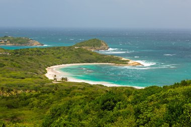Tropical Deserted Beach in Half Moon Bay Antigua clipart