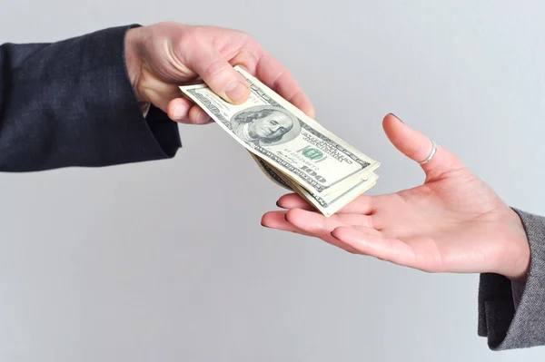 Transfer money from hand to hand — Stock Photo, Image