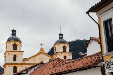 Streets of La Candelaria neighborhood, with buildings from the colonial era, important tourist site of the city, Bogot Colombia July 6, 2022