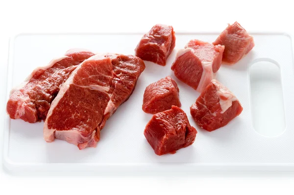Rohe Lammkeule Steaks und Lammwürfel — Stockfoto