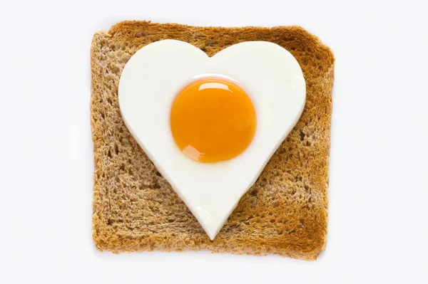 Cooked egg on toast — Stock Photo, Image