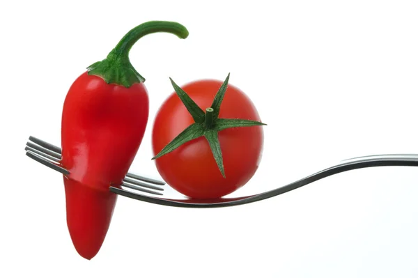 Pimenta de pimentão e tomate em um garfo — Fotografia de Stock