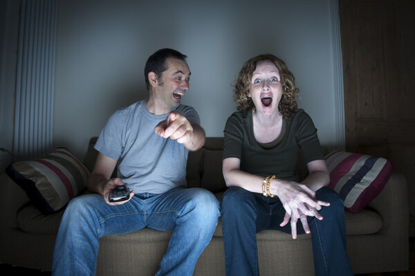 couple enjoying watching television together