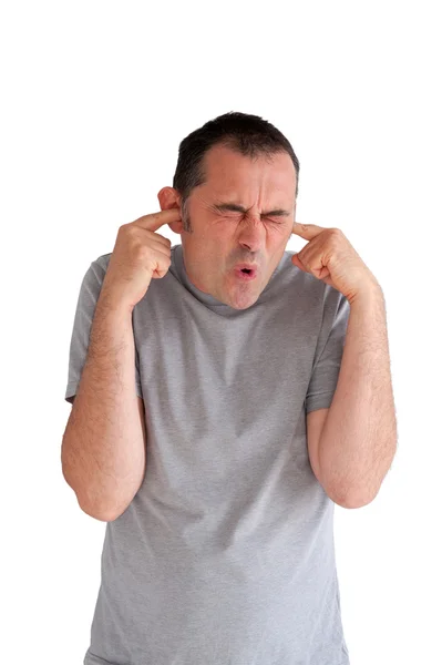 Человек предотвращает повреждение слуха — стоковое фото