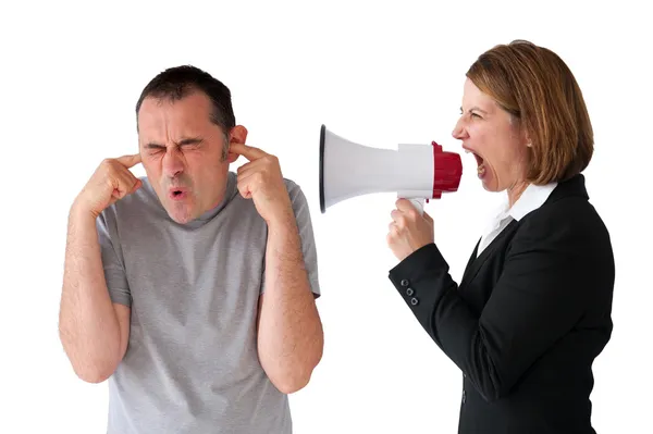 Man being yelled at by female manager Stock Image