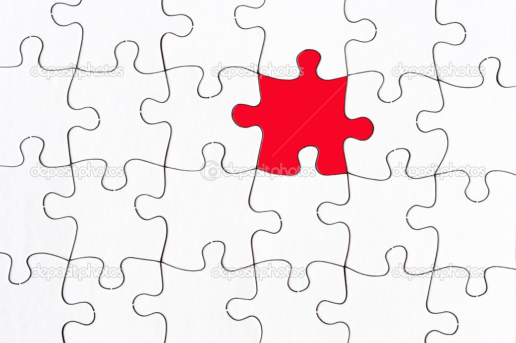 blank white jigsaw with one red piece