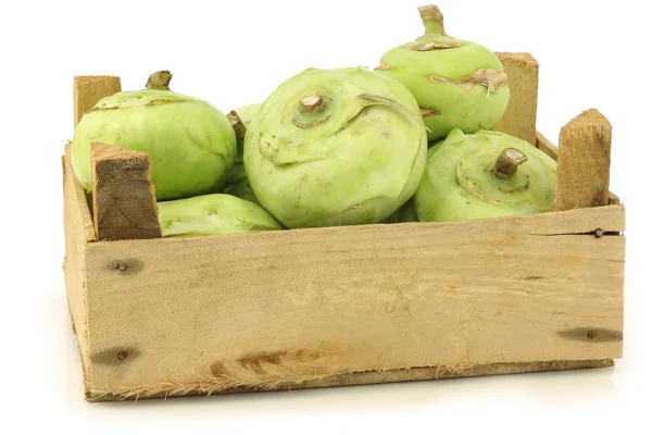 Freshly harvested kohlrabi in a wooden crate — Stock Photo, Image