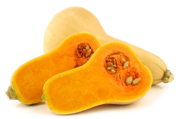 Şişe şeklinde butternut kabak ve bir kesim — Stok fotoğraf