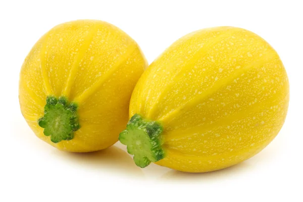 Duas abobrinhas redondas amarelas (Cucurbita pepo ) — Fotografia de Stock