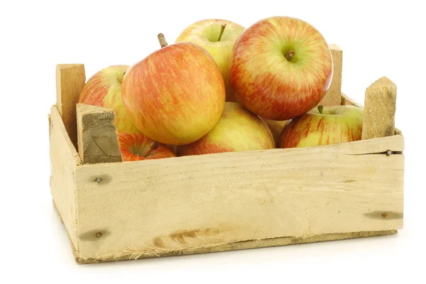 Fresh "Fuji" apples in a wooden crate — Stock Photo, Image