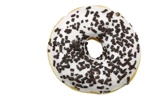 Frisch gebackener, weiß glasierter Donut mit Schokoladenstreuern — Stockfoto