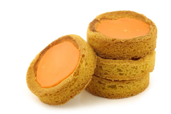 Stacked traditional Dutch orange glazed cakes — Stock Photo, Image