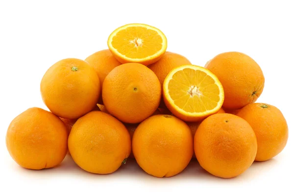 Fresh oranges and two halves — Stock Photo, Image