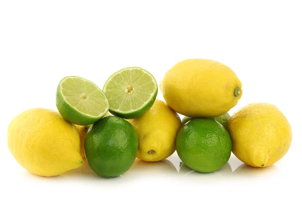 Colorful fresh lime and lemon fruit and some cut ones — Stock Photo, Image