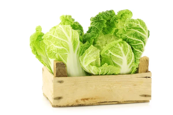 Fresh chinese cabbage in a wooden crate — Stock Photo, Image