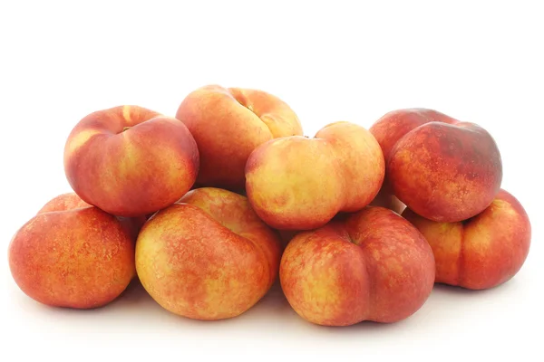 Fresh wild (flat) nectarines — Stock Photo, Image