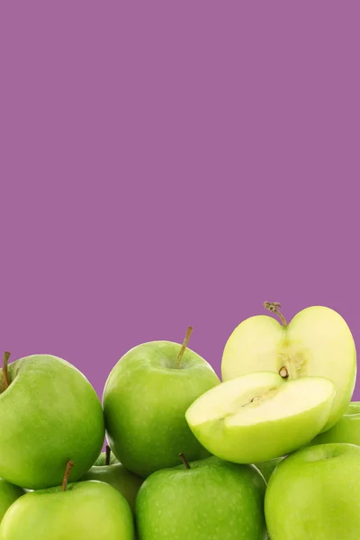 Freshly harvested "Granny Smith" apples on a purple background — Stock Photo, Image