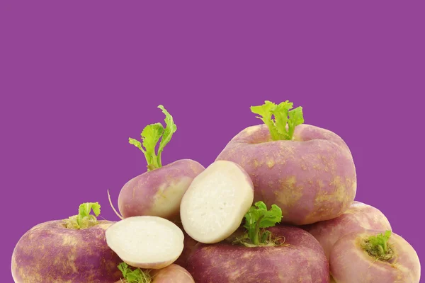 Freshly harvested spring turnip (Brassica rapa) and a cut one — Stock Photo, Image