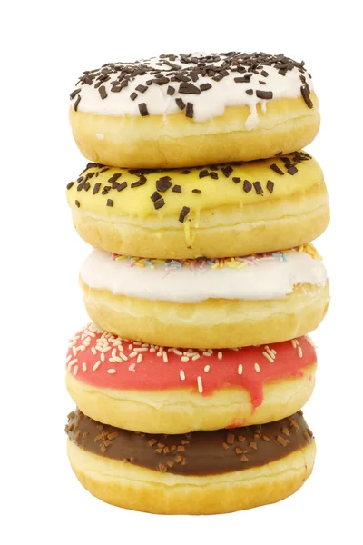 Empilhados sortidos coloridos donuts envidraçados com polvilhas — Fotografia de Stock