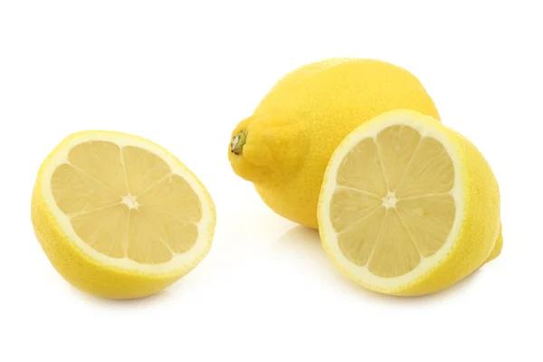 Fresh lemon and a cut one — Stock Photo, Image