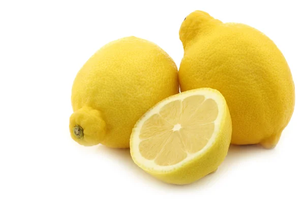 Fresh lemon and a cut one — Stock Photo, Image