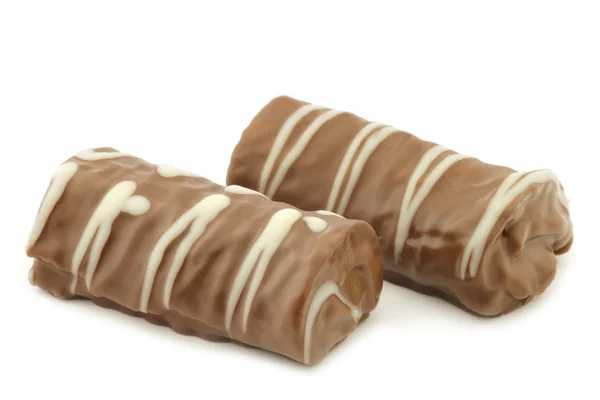 Delicious chocolate and cake roll — Stock Photo, Image