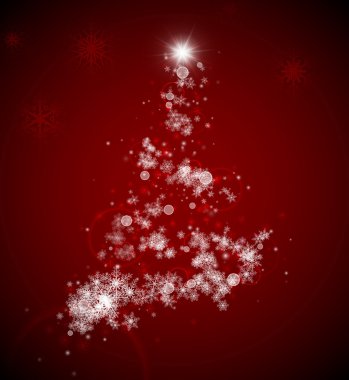 Noel ağacı üzerinden kar taneleri