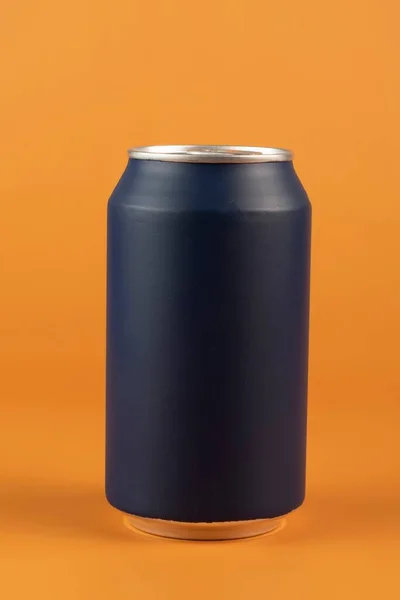 Dark Blue Aluminum Can Isolated Orange Background — Stock Photo, Image