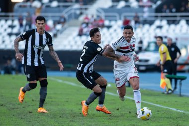 Rio, Brazil - June 16, 2022: Saraiva and Luciano player in match between Botafogo vs Sao Paulo by 12th round of Brazilian Championship in Nilton Santos Stadium