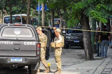 Rio, Brazil - august 03, 2022: CORE car with police beside it during attempted bank robbery