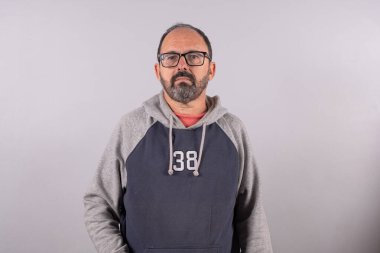 Portrait of happy senior in smart casual real clothes and in profil