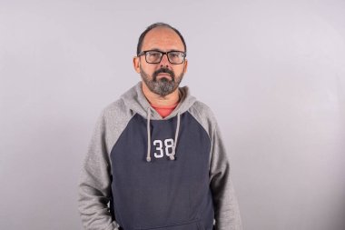 Portrait of happy senior in smart casual real clothes and in profil