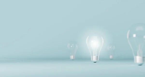Glödlampa Lysande Enastående Bland Glödlampa Ljusblå Bakgrund Begreppet Kreativ Idé — Stockfoto