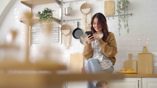 Pretty Young Asian Female Smile Sitting Counter Kitchen Room She — 비디오