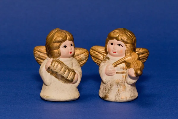 Two ceramic small angels with music instruments — Stock Photo, Image
