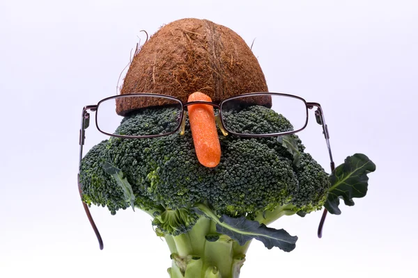 Funny head of broccoli, coconut, carrot with glasses — Stock Photo, Image
