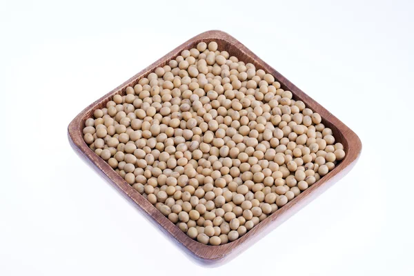 碗里的白色背景上孤立的大豆 — 图库照片