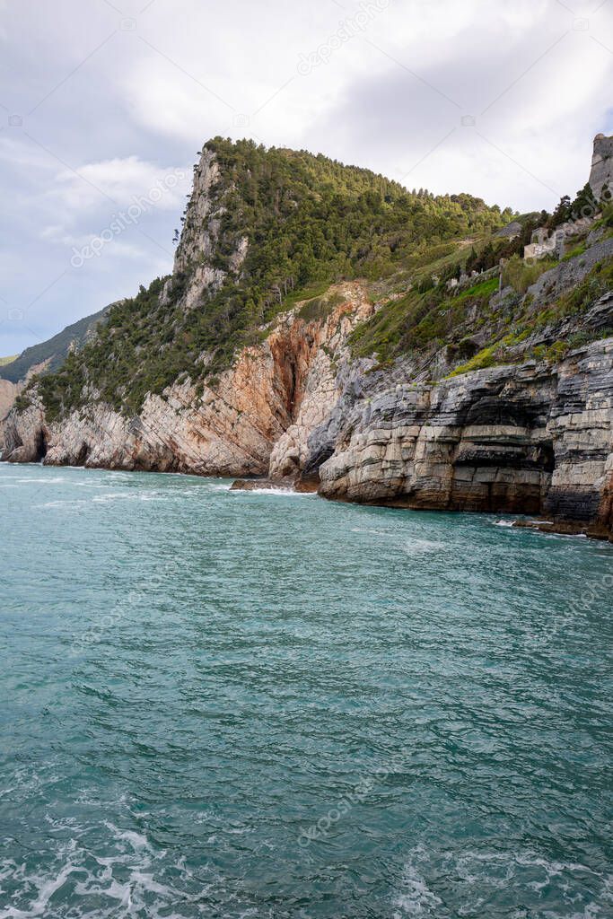 View on Byron Grotto in the Bay of Poets, Portovenere, Italian Riviera, Italy. The rocks in this area are a great geological attraction