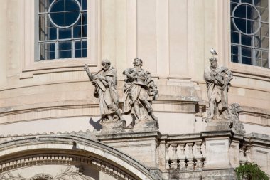 Statues on facade of Church of the Most Holy Name of Mary at the Trajan Forum, Rome, Italy