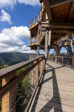 View of Jaworzyna Krynicka from top of wooden observation tower located at the top of the Slotwiny Arena ski station, leading in the treetops, Krynica Zdroj, Beskid Mountains, Slotwiny, Poland 