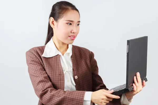 Portrait of businesswoman holding laptop — Stock Photo, Image