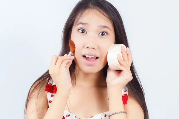 Portrait of Asian women attractive applying blusher — Stock Photo, Image