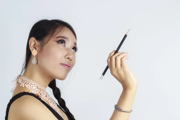 Asian women writing something — Stok fotoğraf