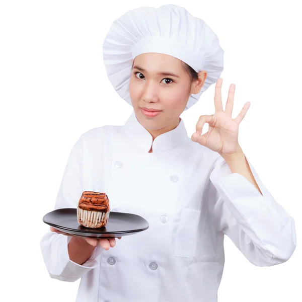 Chef mostrando plate.isolated sobre fondo blanco con recorte p — Foto de Stock