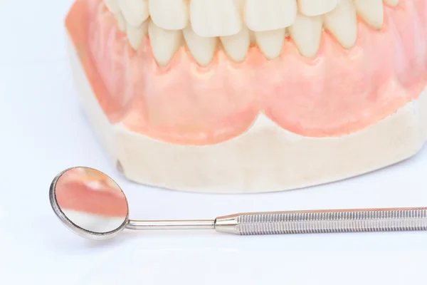 Dentures with a mirror — Stock Photo, Image