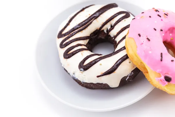 Donuts on the dessert plate. — Stock Photo, Image