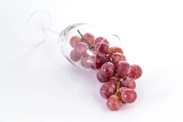 Red grapes and glass — Stock Photo, Image